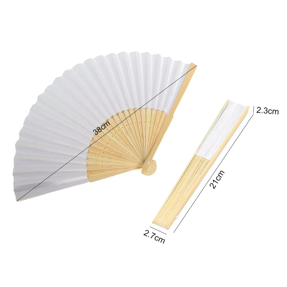 A white and natural bamboo folding hand fan shown in an open, pleated fan shape and a separate stick form.