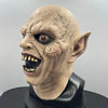 A realistic demon latex mask featuring wrinkled skin and sharp teeth for Halloween