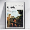 A framed poster featuring a black and white photo of a woman reading, titled Amélie.