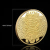 Gold-plated commemorative coin featuring a Maya prophecy calendar design.