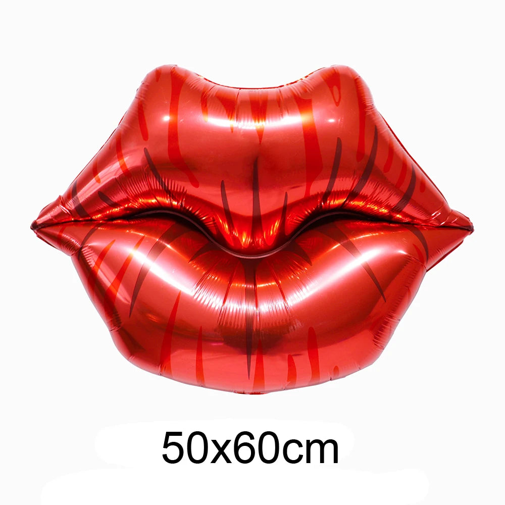 A pair of glossy red heart-shaped balloons with a foil finish.