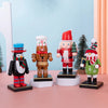 A set of wooden nutcracker soldier ornaments featuring characters in various festive winter attire.