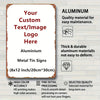 A rectangular aluminum metal sign with custom text or image printed on it.