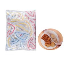 A clear plastic bag filled with reusable elastic food covers in various colors like red, yellow, and blue.