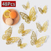 48 pieces of decorative gold-colored 3D butterfly wall stickers displayed on a white background.