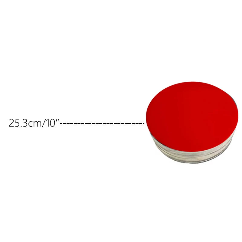 A stack of round red cardboard cake boards, with a dimension line indicating 25.3 cm or 10 inches.
