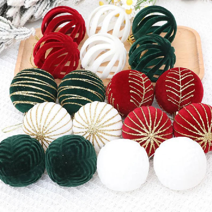 A set of velvet Christmas tree hanging ornaments in red and green, shaped like spirals and spheres.