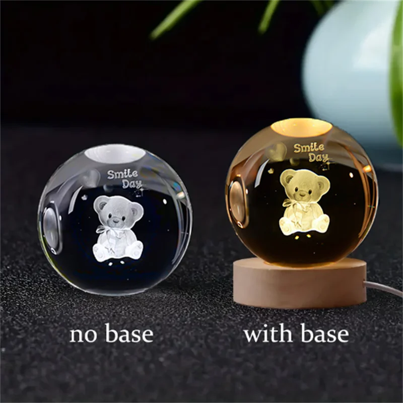 A comparison of a 3D crystal ball night light with and without a wooden base.