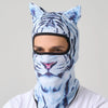 A person wearing a blue and white tiger print ski balaclava with cat ears.