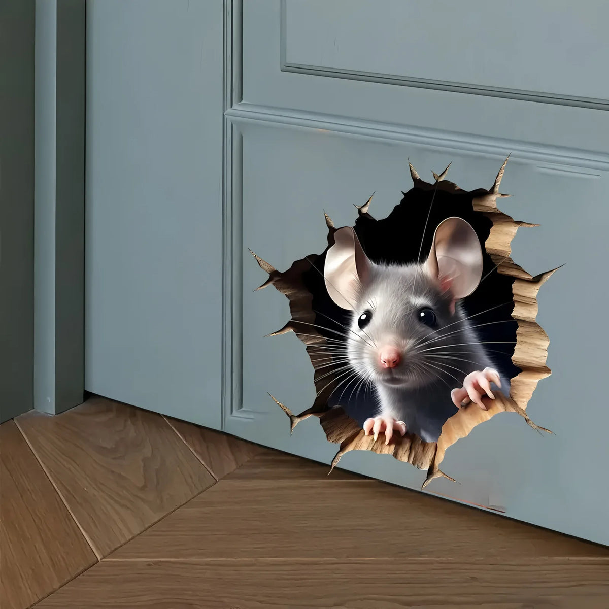 A realistic gray mouse head decal is placed on a white door frame, showing its detailed whiskers and ears.