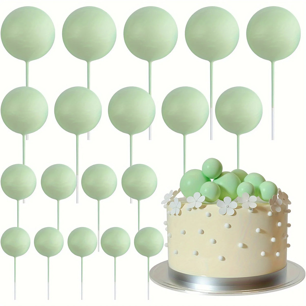 A set of twenty light green mini foam ball cake toppers on white sticks.