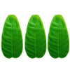A set of five vibrant green tropical banana leaves used as coasters or table protectors.