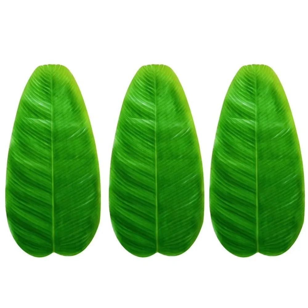 A set of five vibrant green tropical banana leaves used as coasters or table protectors.