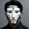 A person wearing a white and black tactical warden cosplay mask with a stylized face design.