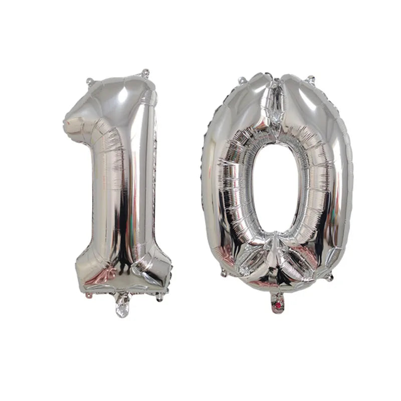 Silver foil number balloons shaped like the numbers 1 and 0 for birthday party decor