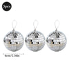 Three silver disco mirror balls with hanging loops for parties and decor