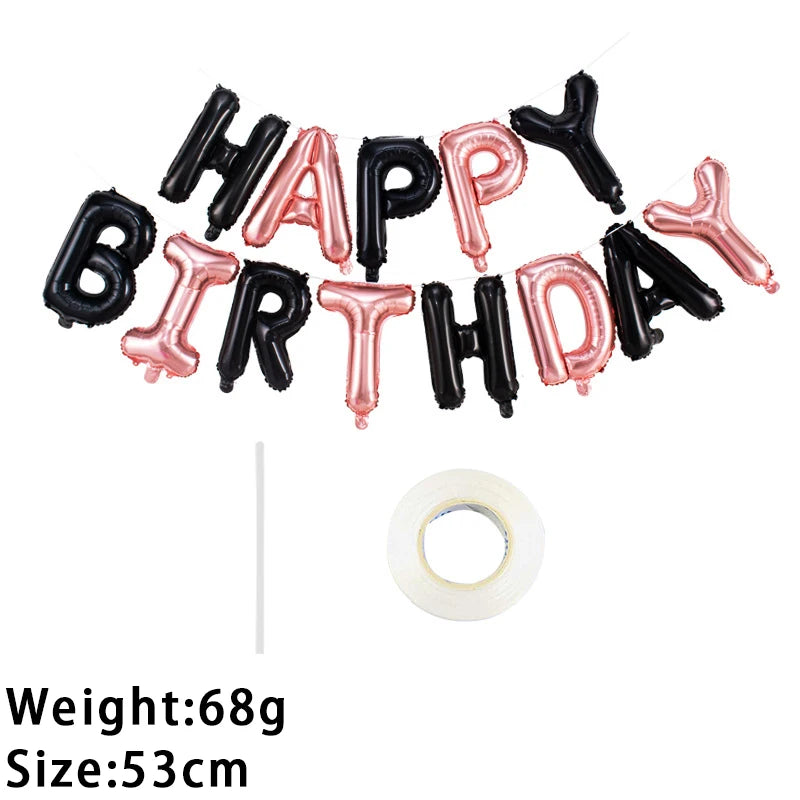 A set of 13 foil letter birthday balloons in black and pink colors arranged in a banner shape.