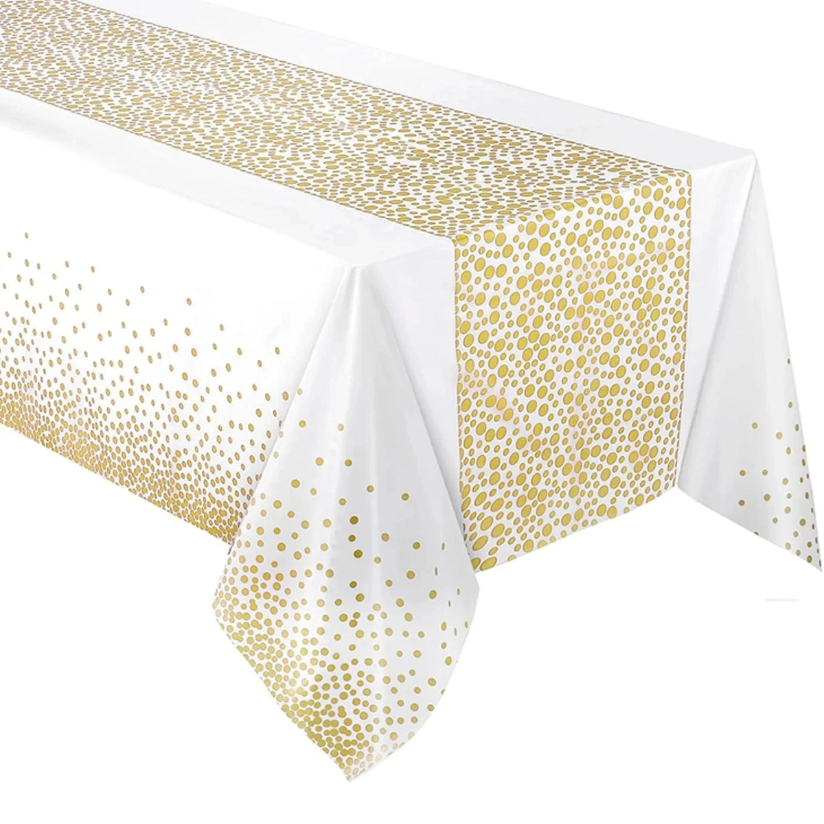 White tablecloth with gold polka dots covering a rectangular table surface.