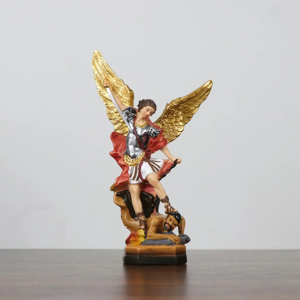 Resin statue of Saint Michael the Archangel with golden wings and armor