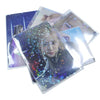 A stack of holographic card sleeves featuring a portrait of a woman with sparkling stars and light effects.
