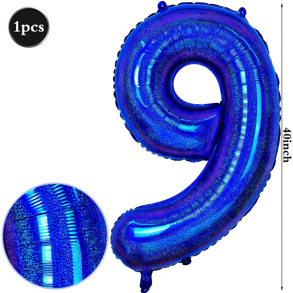 A large, iridescent blue foil number balloon shaped like the numeral 9.