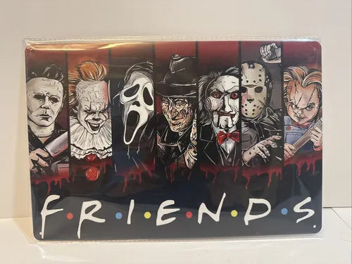Metal wall art sign featuring stylized faces from classic horror movies, titled Friends.