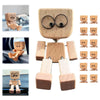 A set of wooden figurines depicting a man with large eyes, used for fun car and desk decoration.