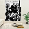 A black and white anime tapestry featuring a female character with spiky hair playing an electric guitar.