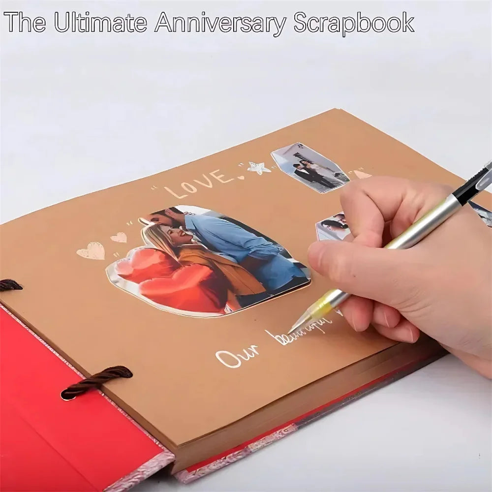 A hand is writing on a brown kraft scrapbook album titled Love Our beautiful memories