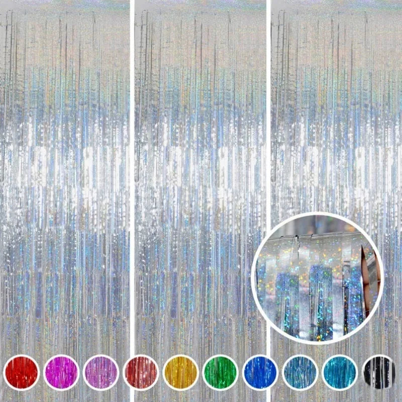 A set of metallic foil tinsel fringe backdrop strands in various colors displayed against a light background.
