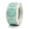 Roll of heart shaped thank you stickers in light green packaging