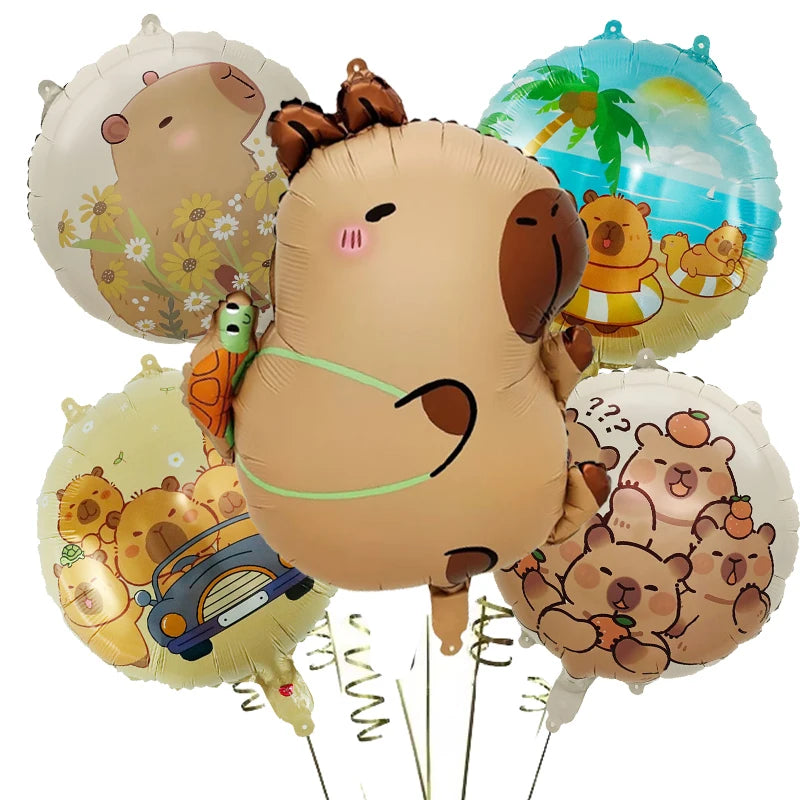 A set of five foil balloons shaped like cartoon capybaras in various colors and styles.