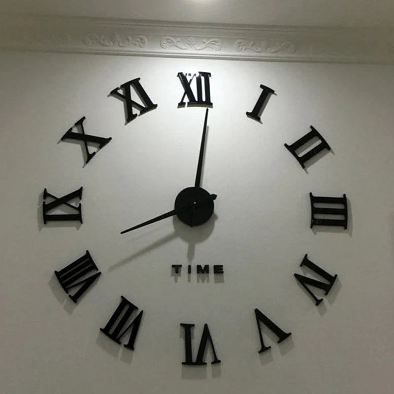 A large black acrylic wall clock face with Roman numerals and hands displaying the time.