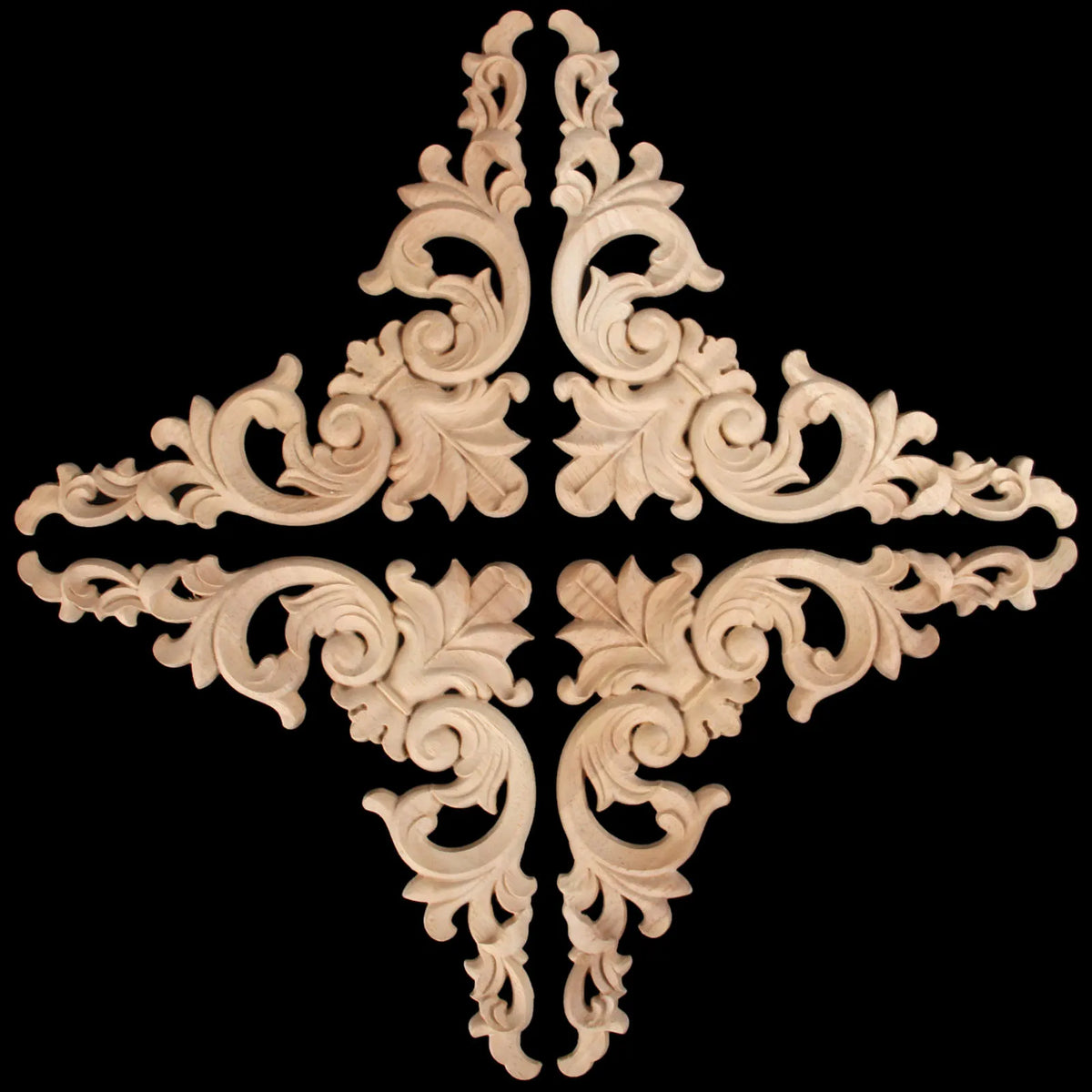A pair of intricately carved oak wood corner decorations featuring floral and branch motifs.