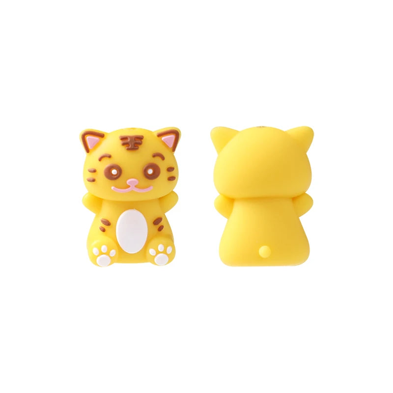 Two yellow silicone cat-shaped beads for jewelry making and DIY crafts