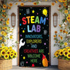 A dark chalkboard door banner decorated with colorful text and stars welcoming innovators, explorers, and creatives.