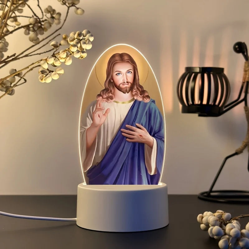 A ceramic illuminated night light depicting Jesus Christ with a beard and halo, set on a white base.