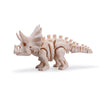 A light beige 3D printed figurine of a dinosaur skeleton, featuring a T-Rex and Mosasaurus.