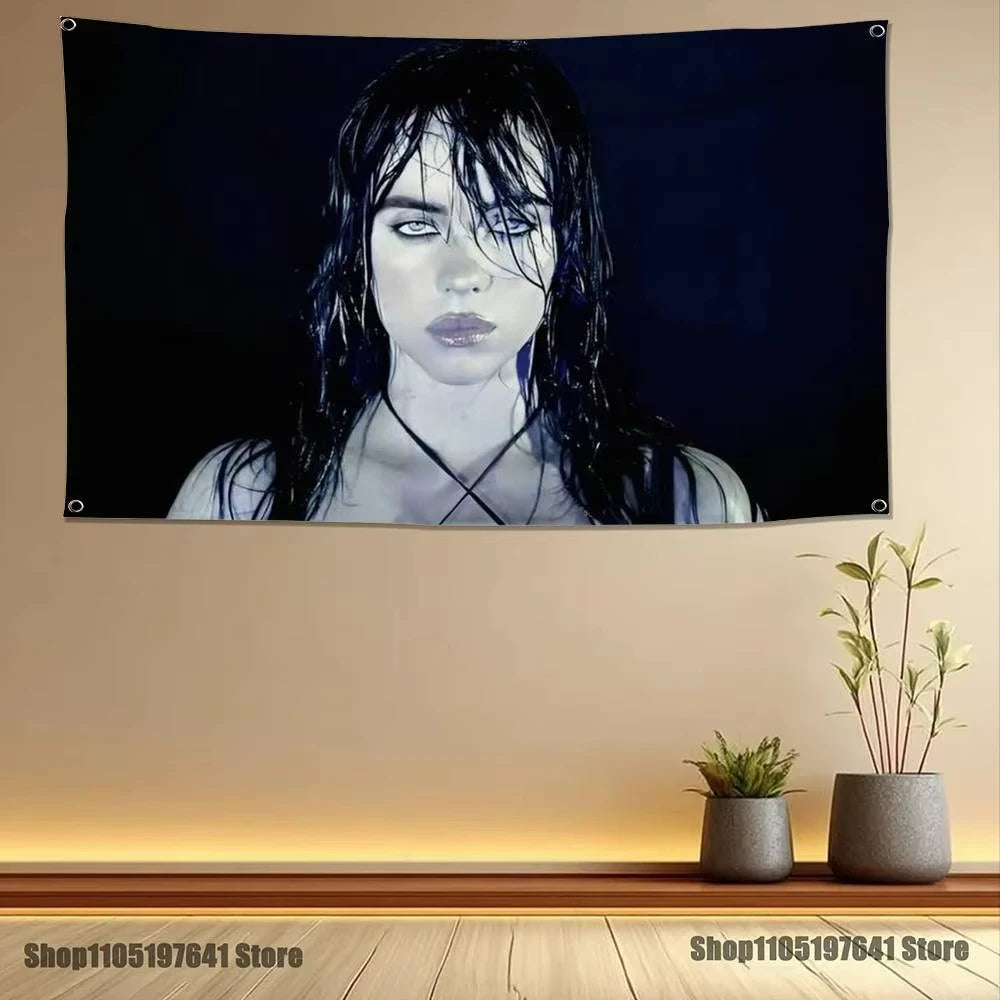 A dark portrait of a woman with long black hair looking directly at the viewer on a canvas banner.