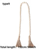 Boho farmhouse tassel bead wall hanging with a long beaded strand and fabric tassels