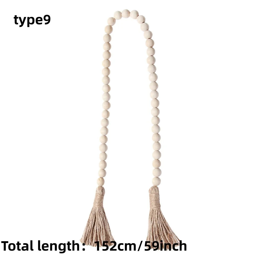 Boho farmhouse tassel bead wall hanging with a long beaded strand and fabric tassels