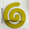 A bright yellow, cherry-shaped wooden wall shelf with a spiral design mounted on a white wall.