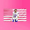 A male athlete wearing a Buffalo Bills jersey with the number 17 stands in front of a pink American flag tapestry.