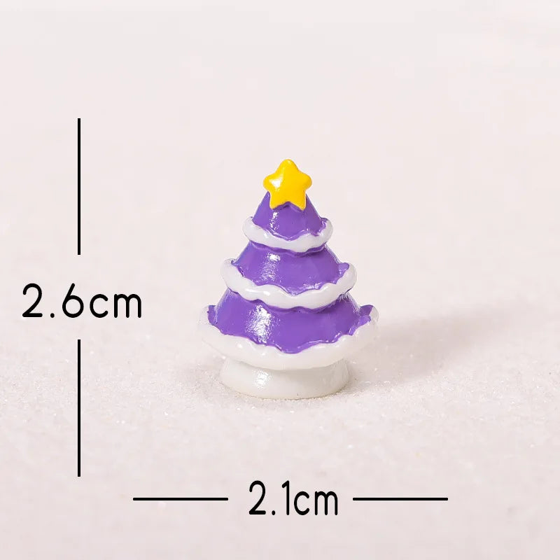 A small purple and white resin Christmas tree charm with a yellow star topper.