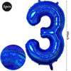 A large, iridescent blue foil number balloon shaped like the number 3.