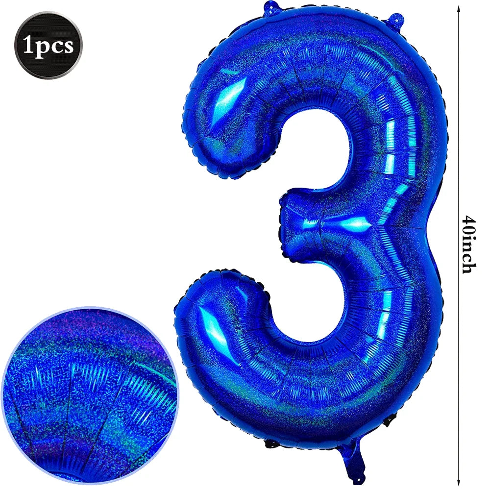 A large, iridescent blue foil number balloon shaped like the number 3.