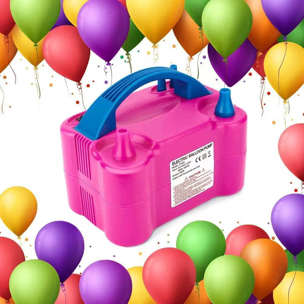 A pink electric balloon pump with a blue handle and various colored balloons scattered around it.