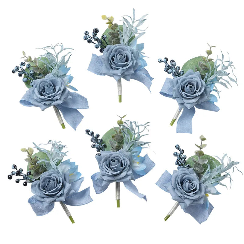 A set of six dusty blue silk rose boutonnières featuring blue flowers and green foliage.