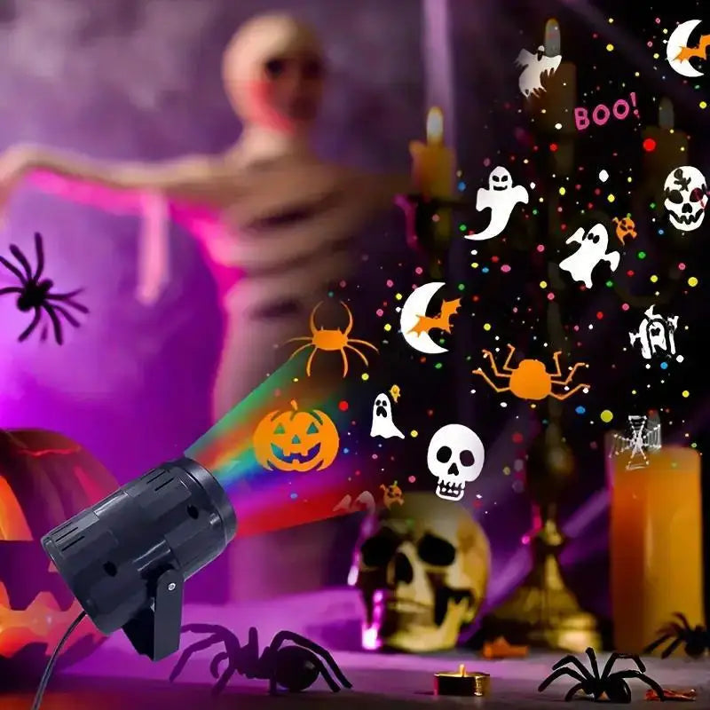 An outdoor LED projector light illuminates various Halloween decorations like spiders, skulls, and spooky patterns.