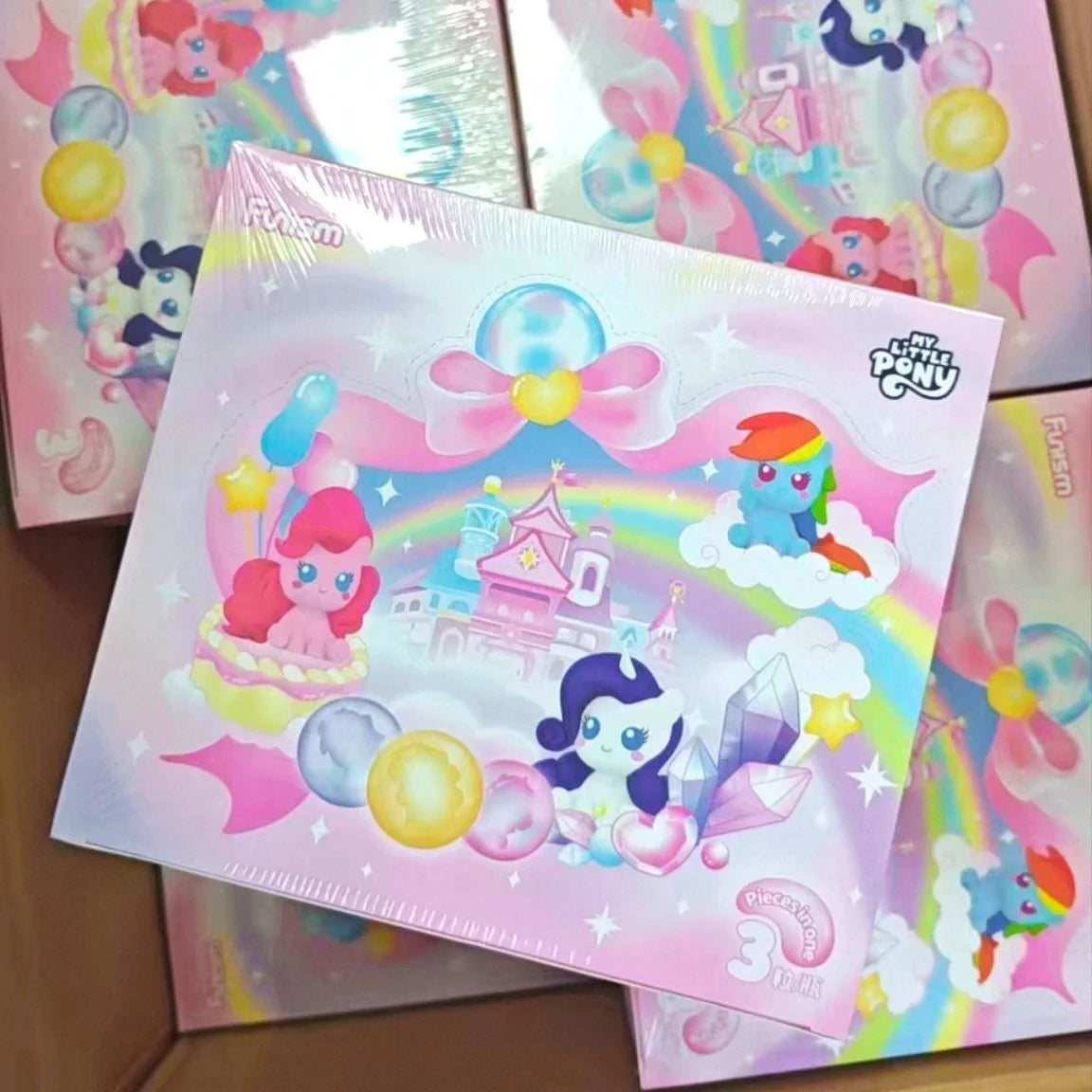 A packaged My Little Pony Magic Bottle collectible figurine in pink and purple packaging.